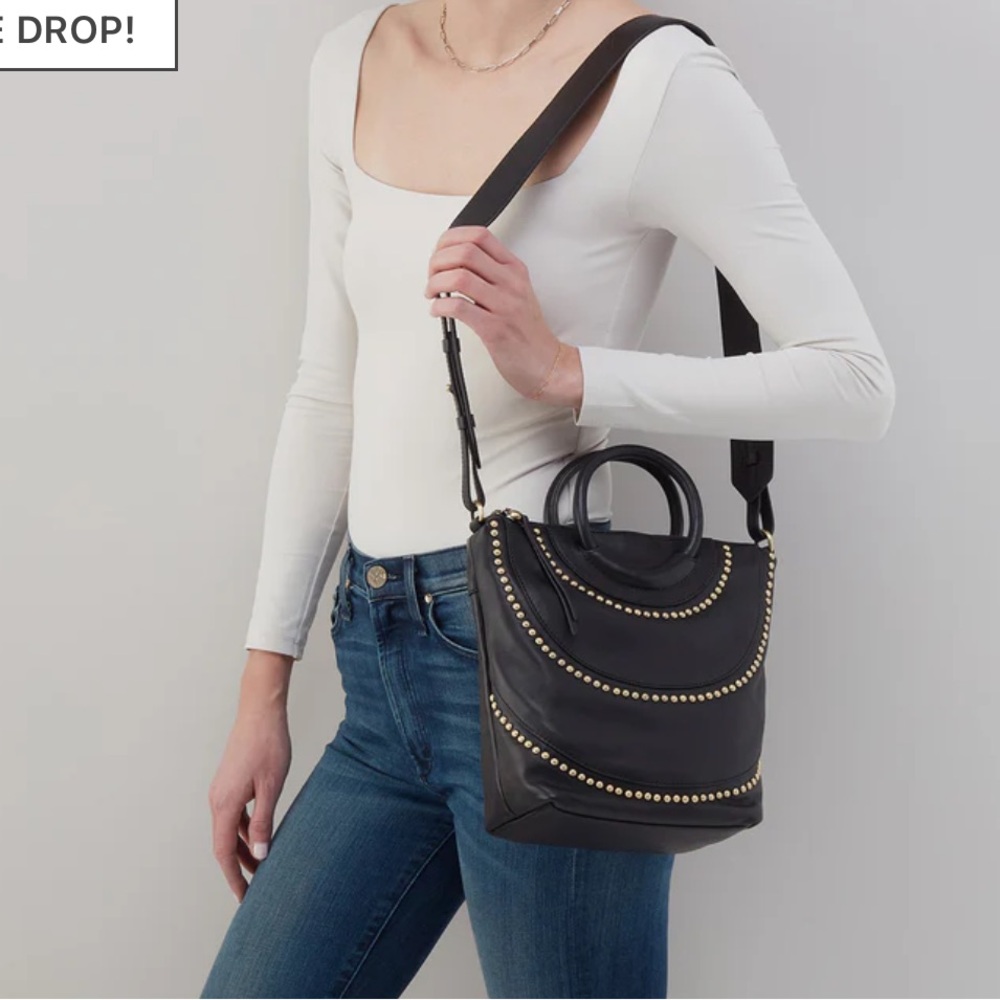 Hobo Maggie black pebbled leather handbag with brass studs